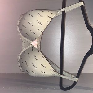 Green and black logo pink bra